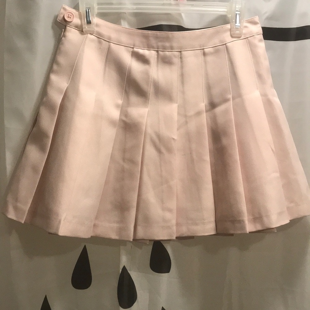 Pale pink mini skirt